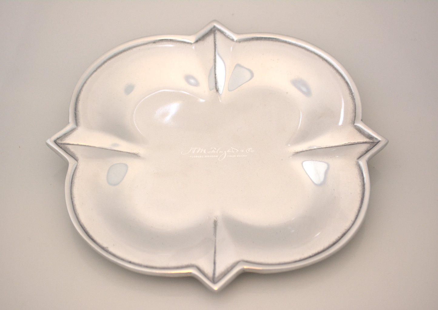 white tray with HM Flagler engraved